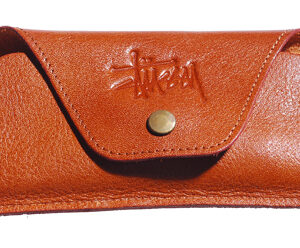 A brown eyewear case made from leather