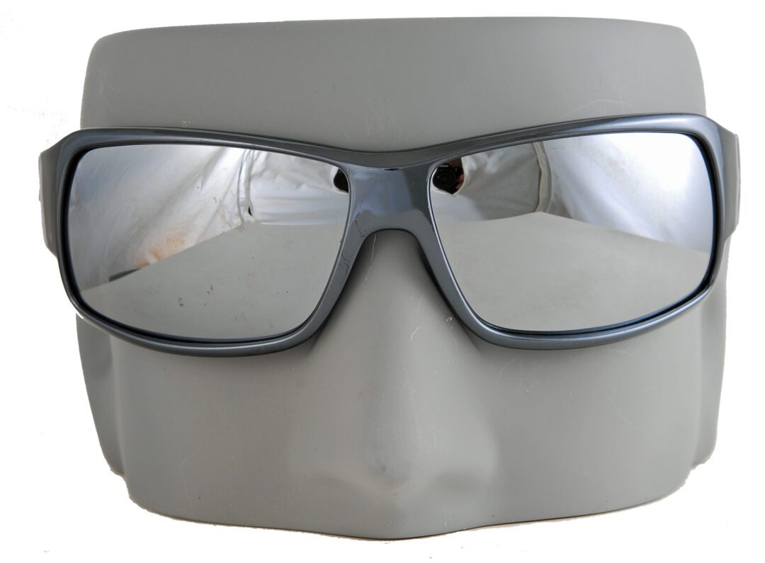 Sunglasses on gray face mask