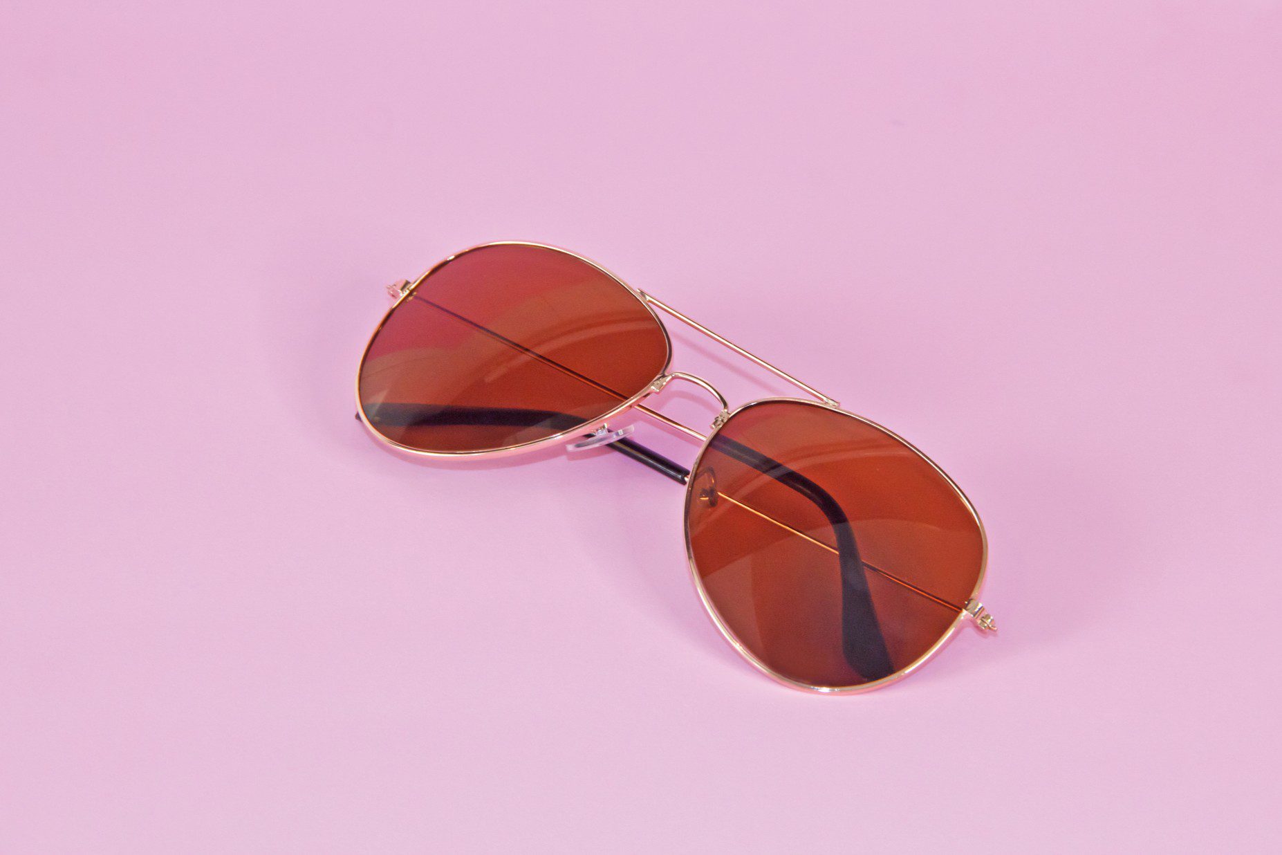 Aviator sunglasses with red lenses