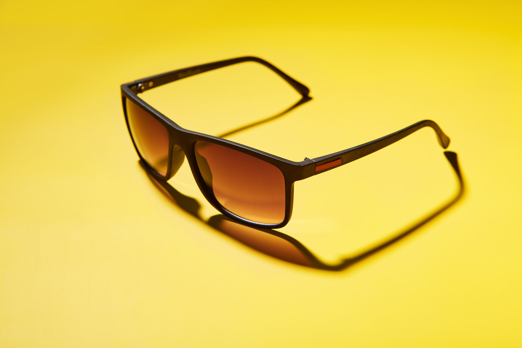 Stylish sunglasses with brown lenses