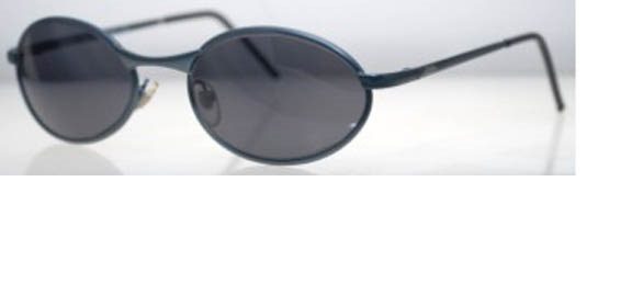 Black oval-shaped sunglasses on display