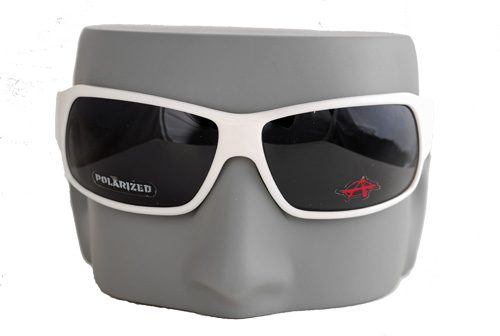 White-framed sunglasses on gray model